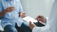 Patient talking to a doctor about their medical history.